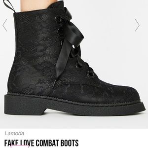 Lace Lamoda combat boots.